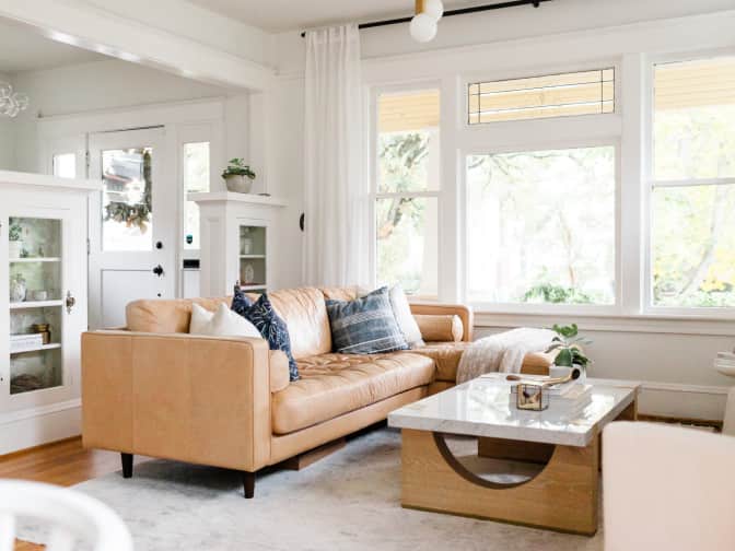 Image of a leather couch in a living room. 